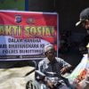 Kapolres Bukittinggi AKBP Iman Pribadi Santoso, SIK., MH serahkan bantuan sembako