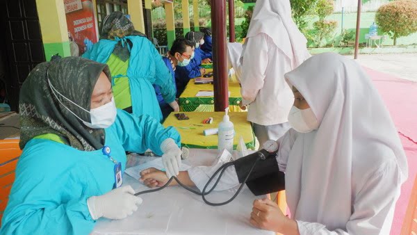 Pelaksanaan Vaksinasi Usia 12-17 Tahun, Di Lingkungan Sma 1 Pulau Punjung Kabupaten Dharmasraya