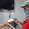 Dokter Kontingen Sumbar Afriawardi Saat Mencek Hasil Operasi Dion Saputra Di Mes Atlet Muaythai.