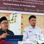 Masnaidi ( kiri) Foto Kominfo Padang Panjang